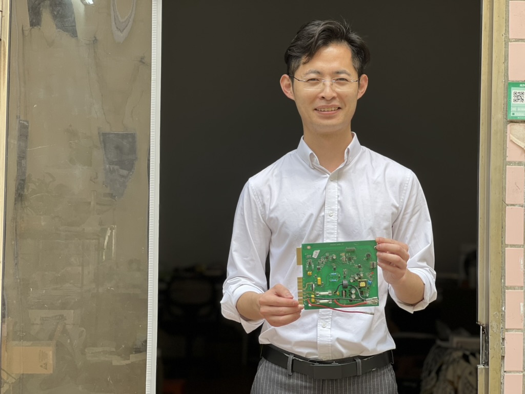 Insyght partner in Shenzhen holding a PCB
