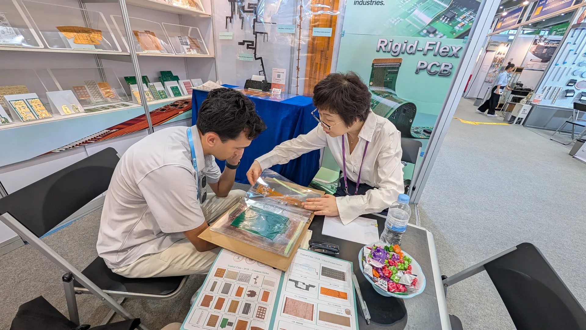 Evaluating PCB components at electronics trade show